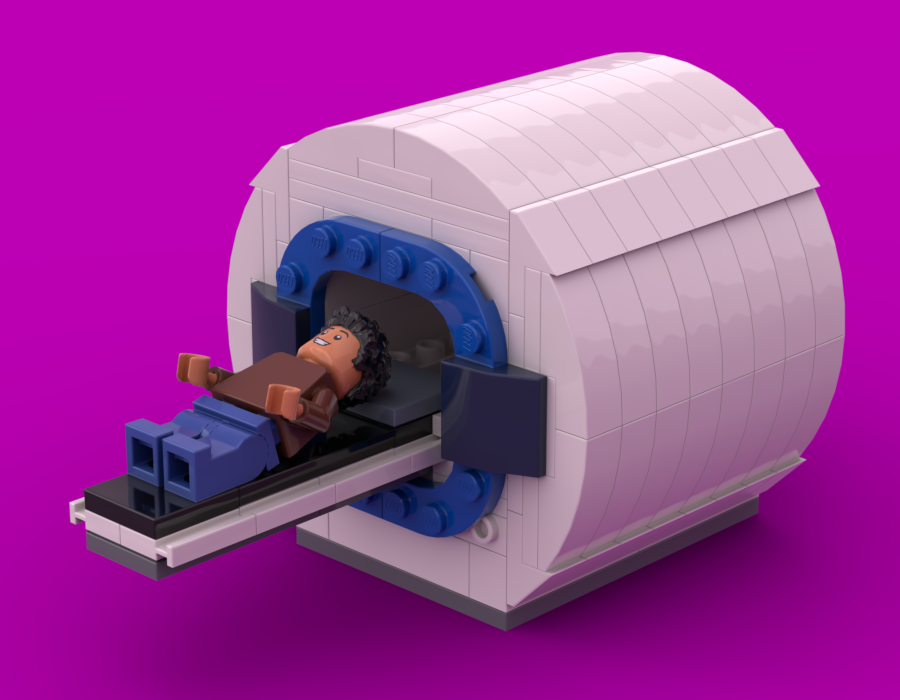 White MRI Scanner made of LEGO with a minifigure on it